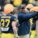 Former Michigan football player Kevin Koger shows a play book during spring practice at Michigan Stadium on Saturday, April 13, 2013. Melanie Maxwell I AnnArbor.com